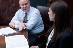 Man and woman meeting at HSB Law Firm, Texas